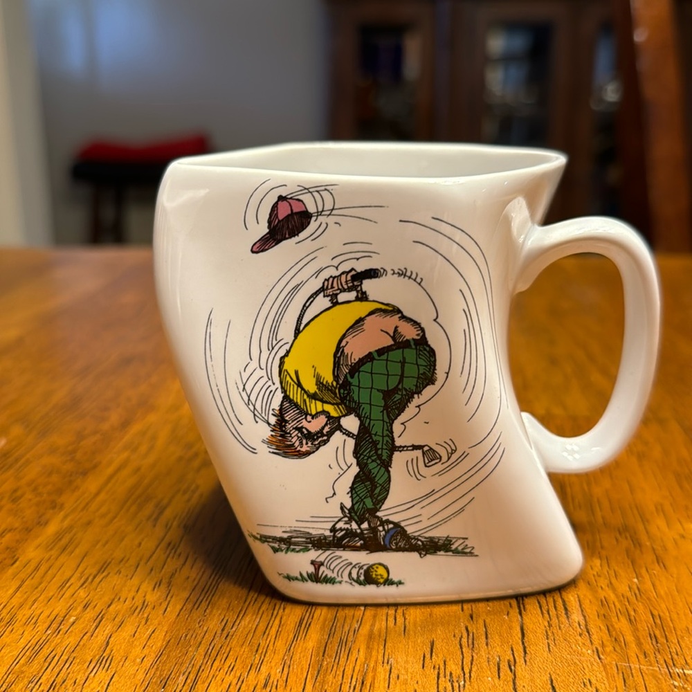 Vtg. Funny/novelty “ The results of over golf swing” golf mug. 12 oz.